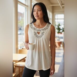 Super cute French Laundry cream tank with embellishment. Size L